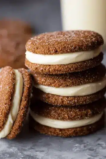 Ginger Molasses Sandwich Cookies with Eggnog Frosting